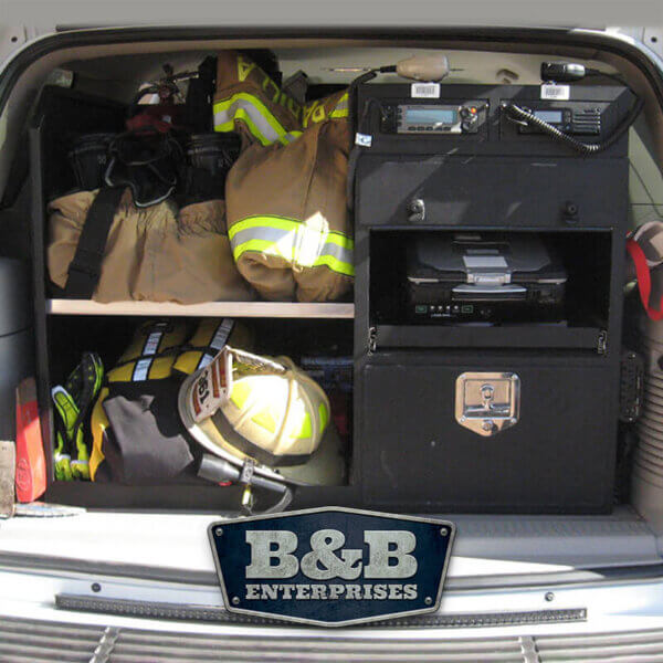 command box with fire equipment in the back of a SUV